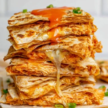 Cozy Buffalo Chicken Quesadillas stacked with flavorful chicken and cheese