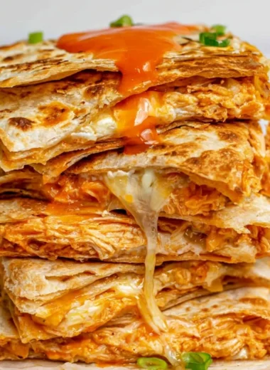 Cozy Buffalo Chicken Quesadillas stacked with flavorful chicken and cheese