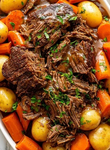 Delicious crockpot chuck roast with vegetables ready to serve.