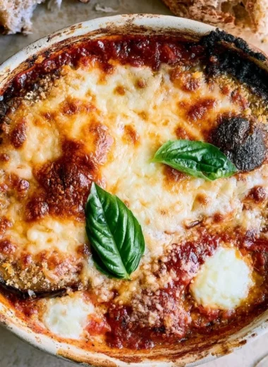 Deliciously baked Eggplant Parmesan with cheese and marinara sauce