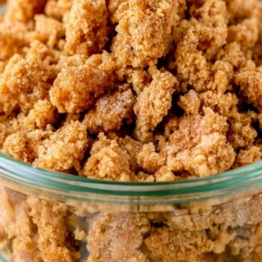 A delicious bowl of graham cracker crumble ready for dessert toppings.