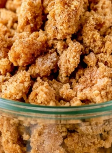 A delicious bowl of graham cracker crumble ready for dessert toppings.