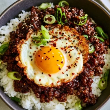 Delicious Korean Ground Beef Bowl garnished with green onions and sesame seeds
