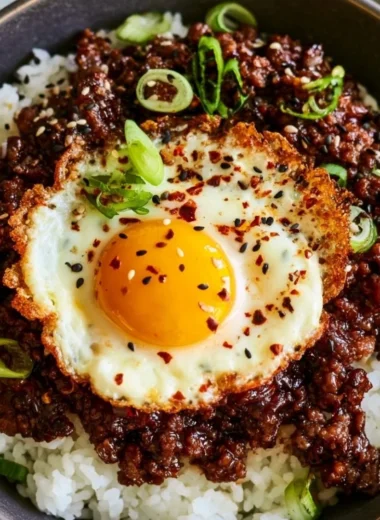 Delicious Korean Ground Beef Bowl garnished with green onions and sesame seeds