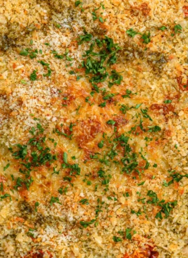 Cozy white bean and pesto bake served in a rustic dish