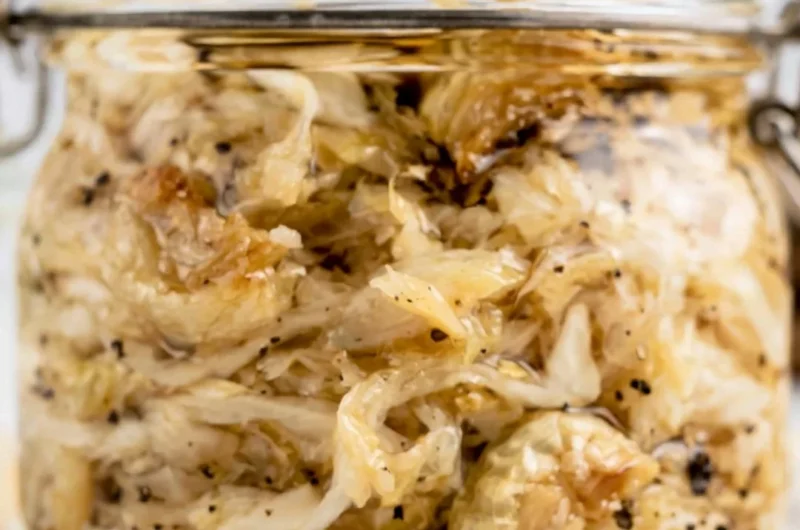 Delicious Roasted Garlic Sauerkraut in a bowl, showcasing rich flavors and vibrant color.
