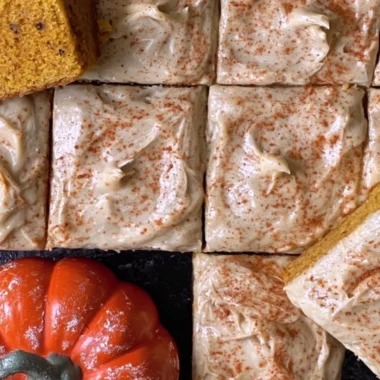 Cozy Pumpkin Spice Latte Cake topped with creamy frosting and autumn spices